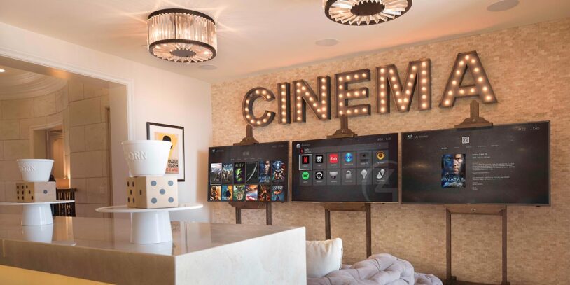 cinema room with custom automated lighting and ceiling speakers